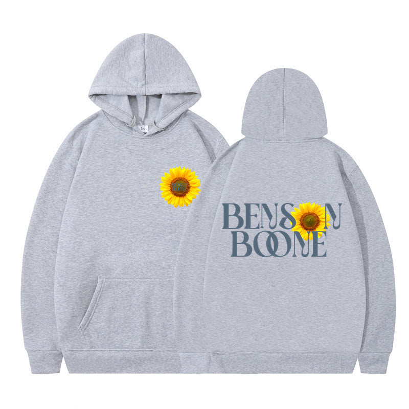 Kvinnors hoodie med unik solrosdesign och bekväm passform Mirla-Eva Jonsson