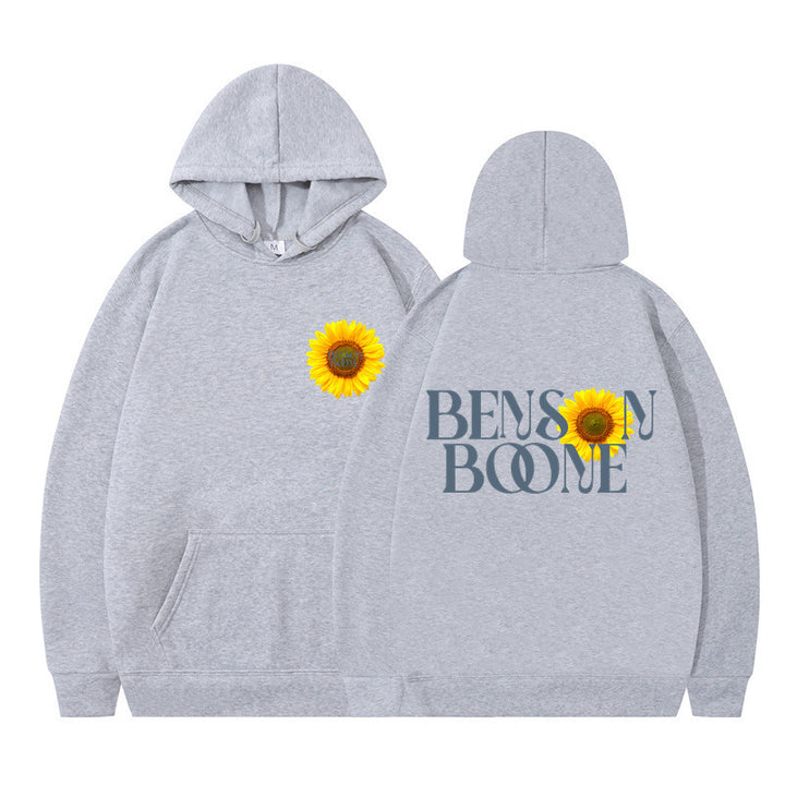 Kvinnors hoodie med unik solrosdesign och bekväm passform Mirla-Eva Jonsson