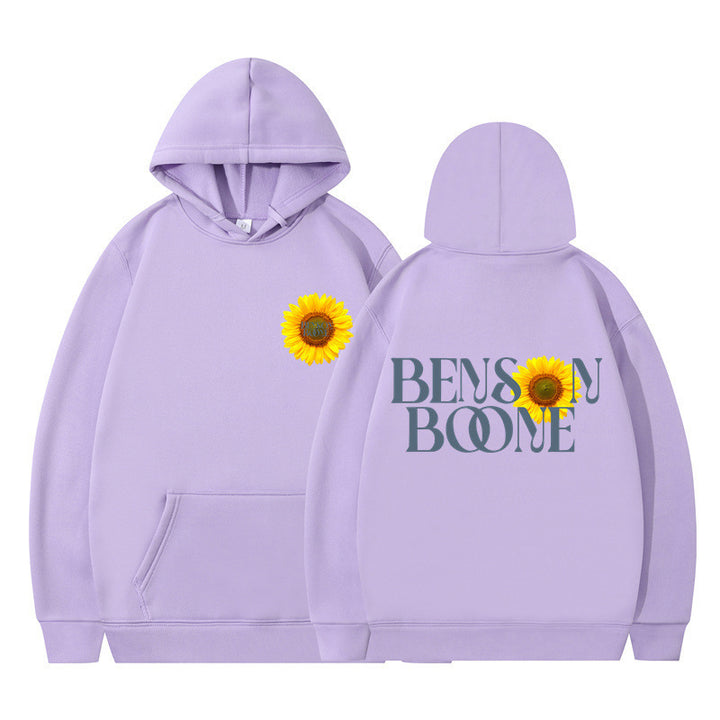 Kvinnors hoodie med unik solrosdesign och bekväm passform Mirla-Eva Jonsson