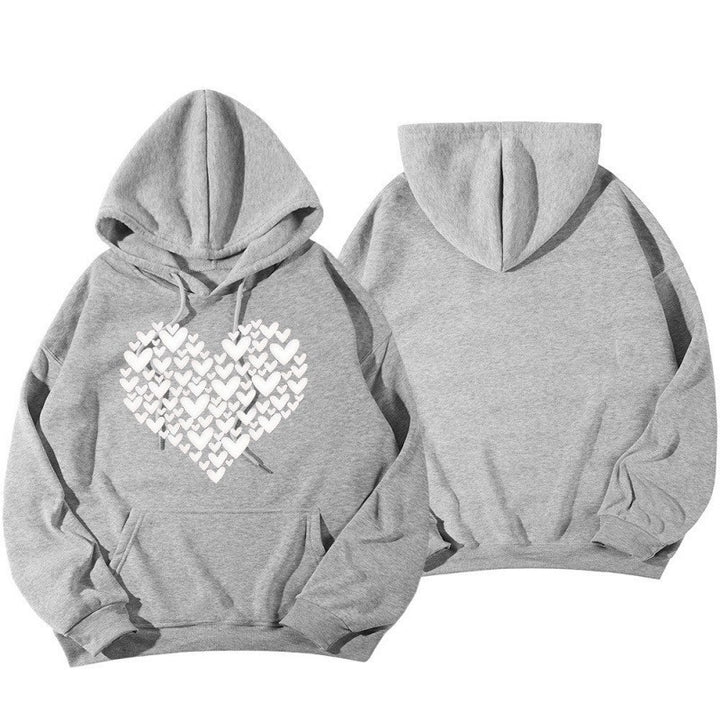 Kvinnors hoodie sweatshirt med stort hjärtformade design Mirla-Eva Jonsson
