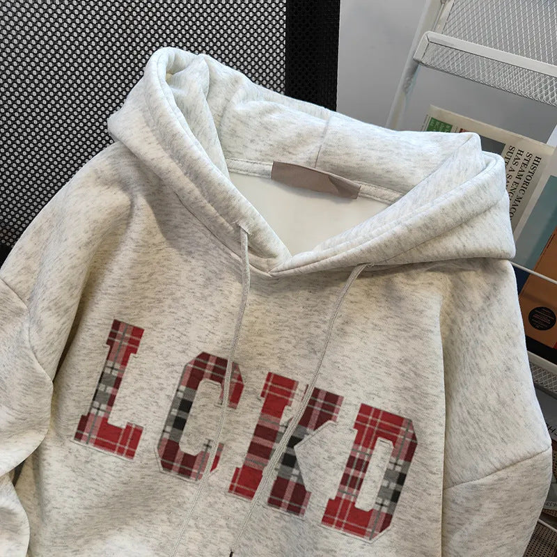 Kvinnors hupptröja med trendig text Mirla-Eva Jonsson