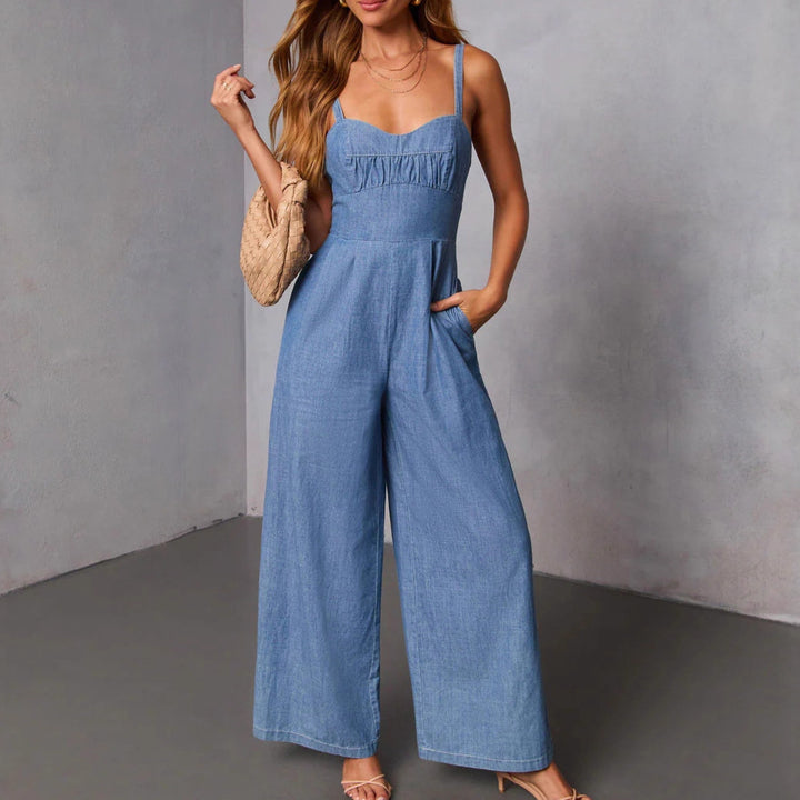 Kvinnors jeans jumpsuit med vida ben och eleganta remmar Mirla-Eva Jonsson