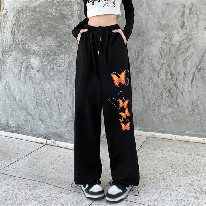Kvinnors joggingsbyxor med färgglad fjärilsdesign Mirla-Eva Jonsson
