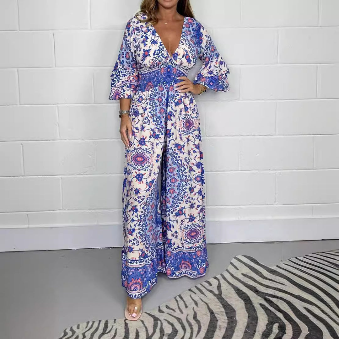 Kvinnors jumpsuit med blommönster och vida utställda ärmar Mirla-Eva Jonsson