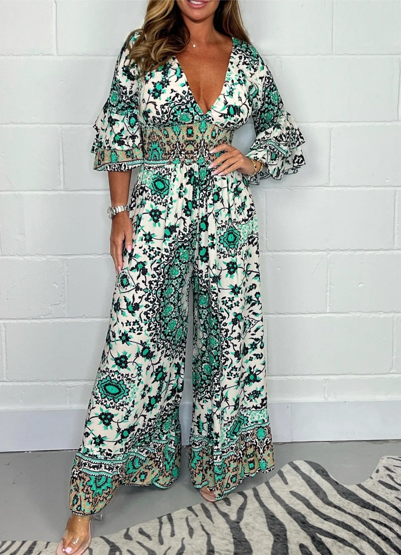 Kvinnors jumpsuit med blommönster och vida utställda ärmar Mirla-Eva Jonsson