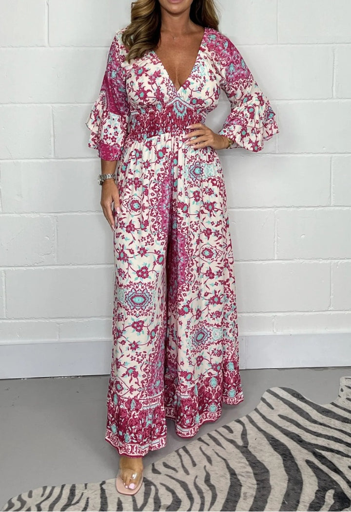 Kvinnors jumpsuit med blommönster och vida utställda ärmar Mirla-Eva Jonsson