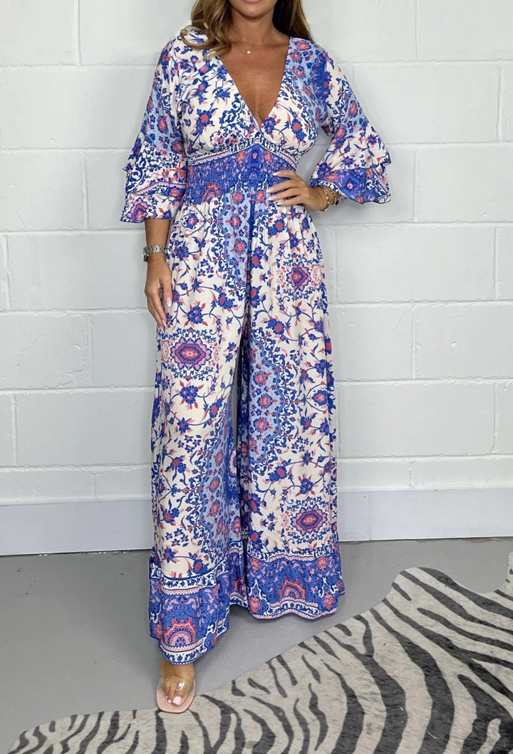 Kvinnors jumpsuit med blommönster och vida utställda ärmar Mirla-Eva Jonsson