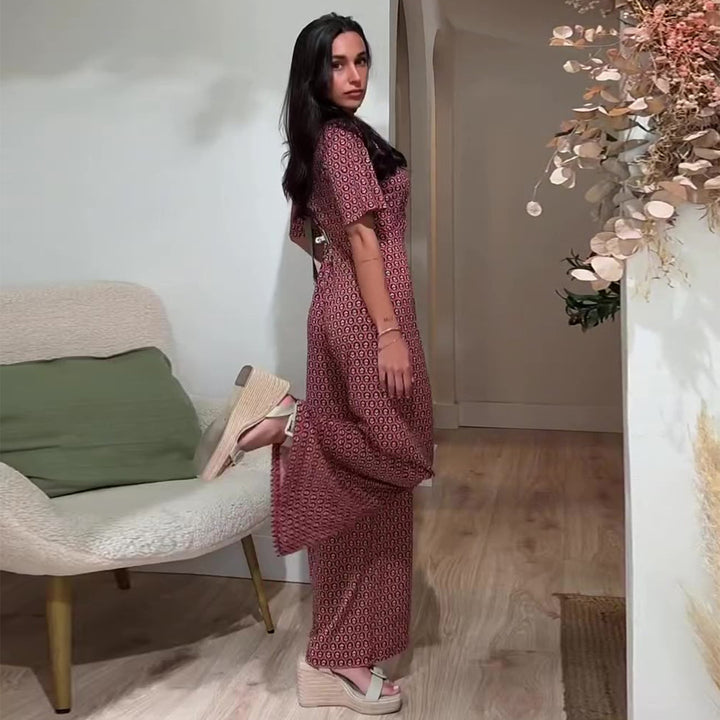 Kvinnors jumpsuit med elastisk midja och djup V-krage Mirla-Eva Jonsson