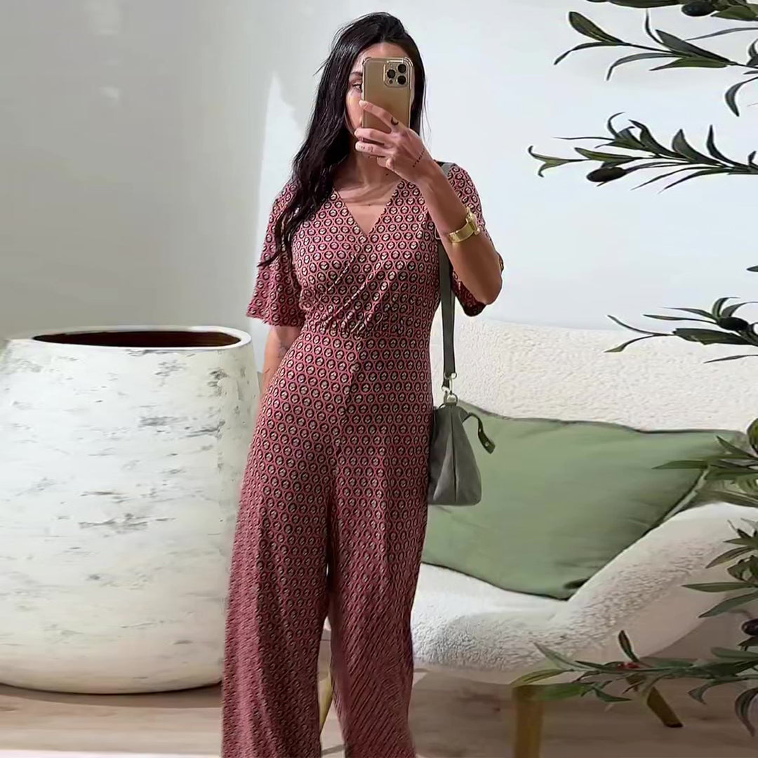 Kvinnors jumpsuit med elastisk midja och djup V-krage Mirla-Eva Jonsson