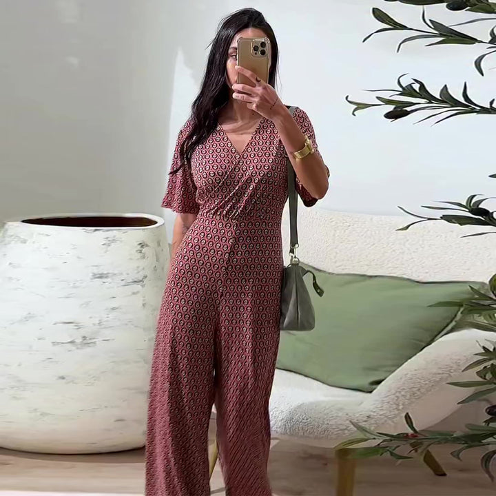 Kvinnors jumpsuit med elastisk midja och djup V-krage Mirla-Eva Jonsson