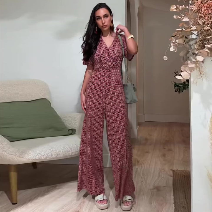 Kvinnors jumpsuit med elastisk midja och djup V-krage Mirla-Eva Jonsson