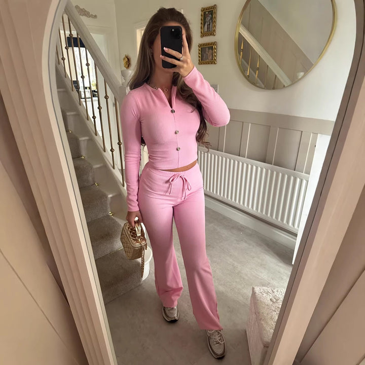 Kvinnors jumpsuit med elegant knappstängning och avslappnad skärning-Eva Jonsson