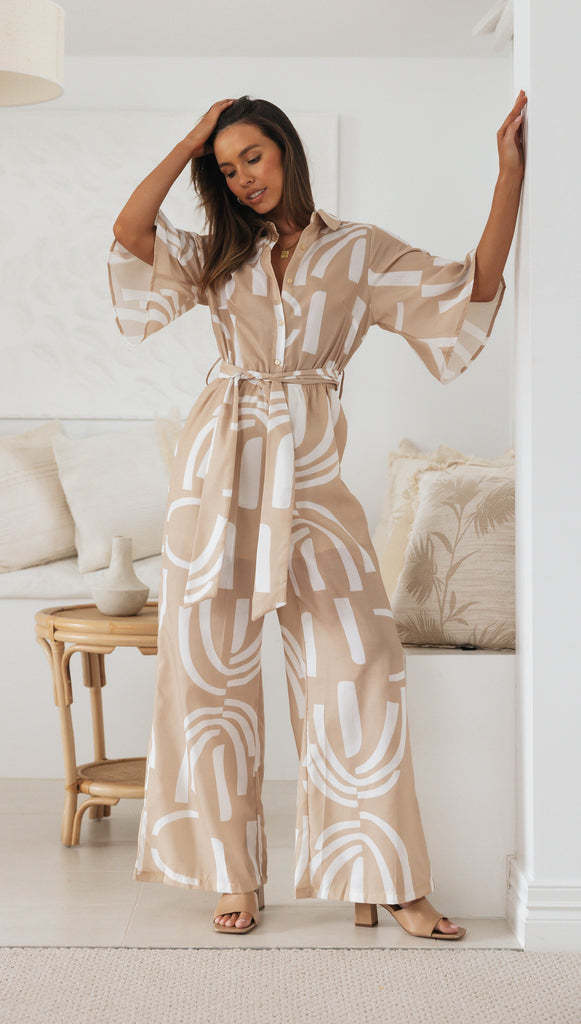 Kvinnors jumpsuit med elegant knytbälte och stiligt mönster Mirla-Eva Jonsson