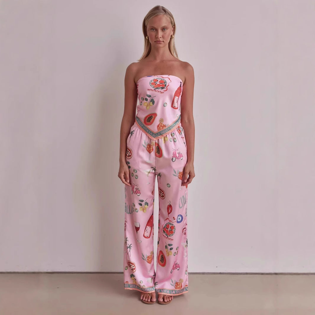 Kvinnors jumpsuit med lekfulla tropiska mönster och elastisk topp Mirla-Eva Jonsson