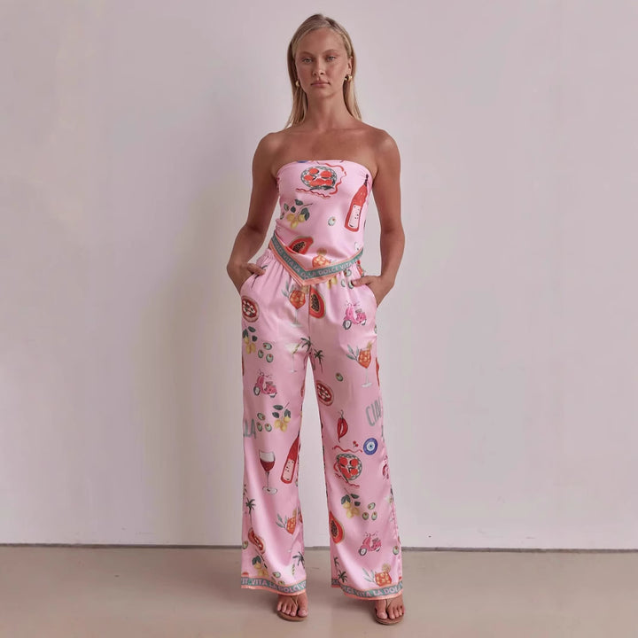 Kvinnors jumpsuit med lekfulla tropiska mönster och elastisk topp Mirla-Eva Jonsson