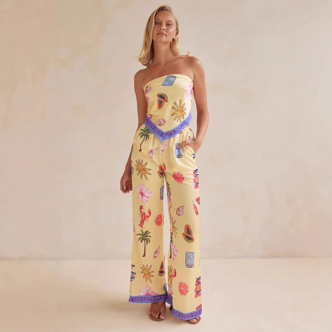 Kvinnors jumpsuit med lekfulla tropiska mönster och elastisk topp Mirla-Eva Jonsson
