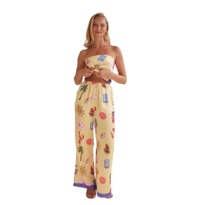 Kvinnors jumpsuit med lekfulla tropiska mönster och elastisk topp Mirla-Eva Jonsson