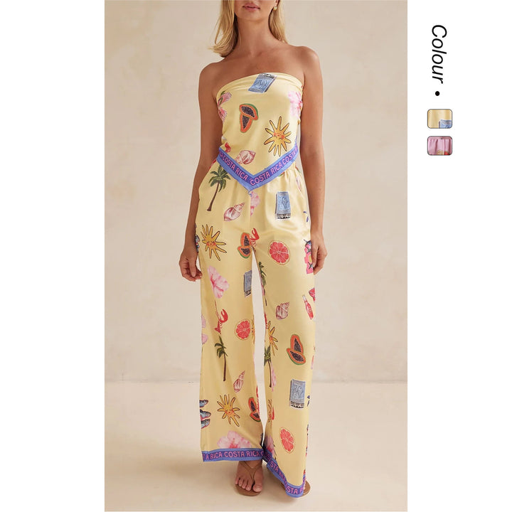 Kvinnors jumpsuit med lekfulla tropiska mönster och elastisk topp Mirla-Eva Jonsson