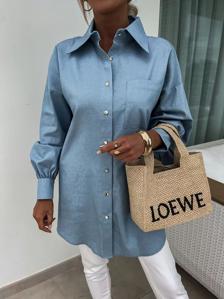 Kvinnors klassiska oversized blus med knappdetaljer och bröstficka Mirla-Eva Jonsson