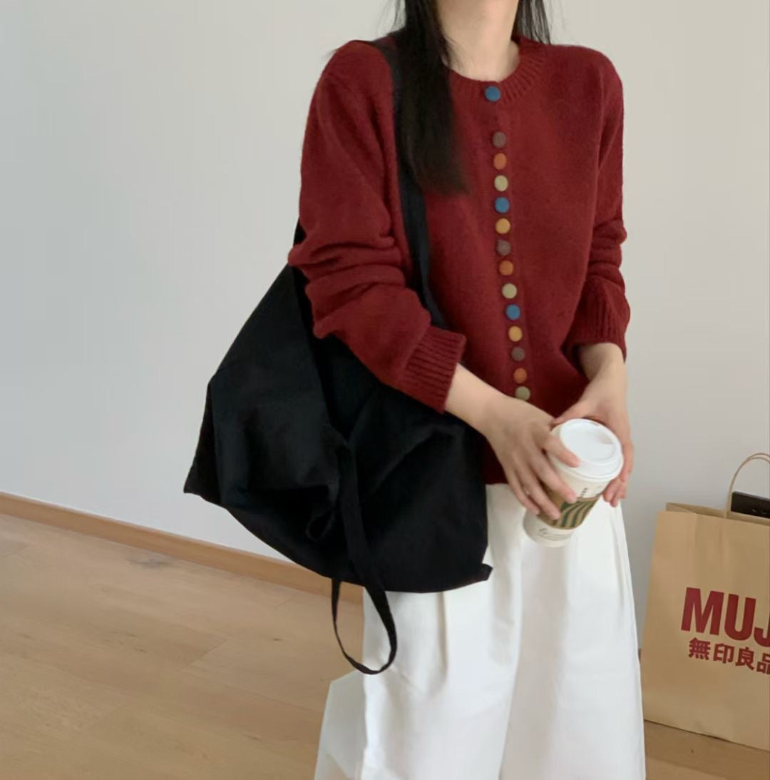 Kvinnors kofta med färgglada knappdetaljer och avslappnad passform Mirla-Eva Jonsson