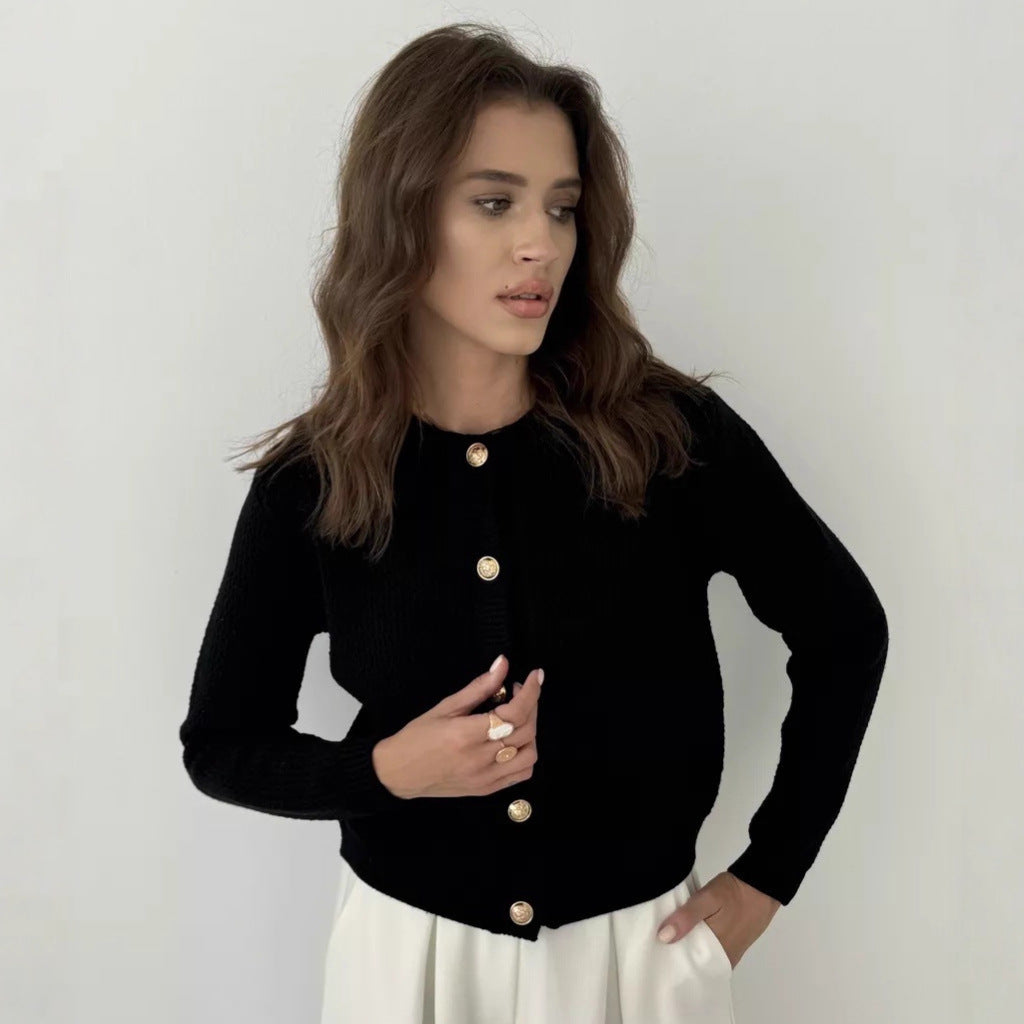 Kvinnors kofta med knapppar och modernt texturmönster Mirla-Eva Jonsson