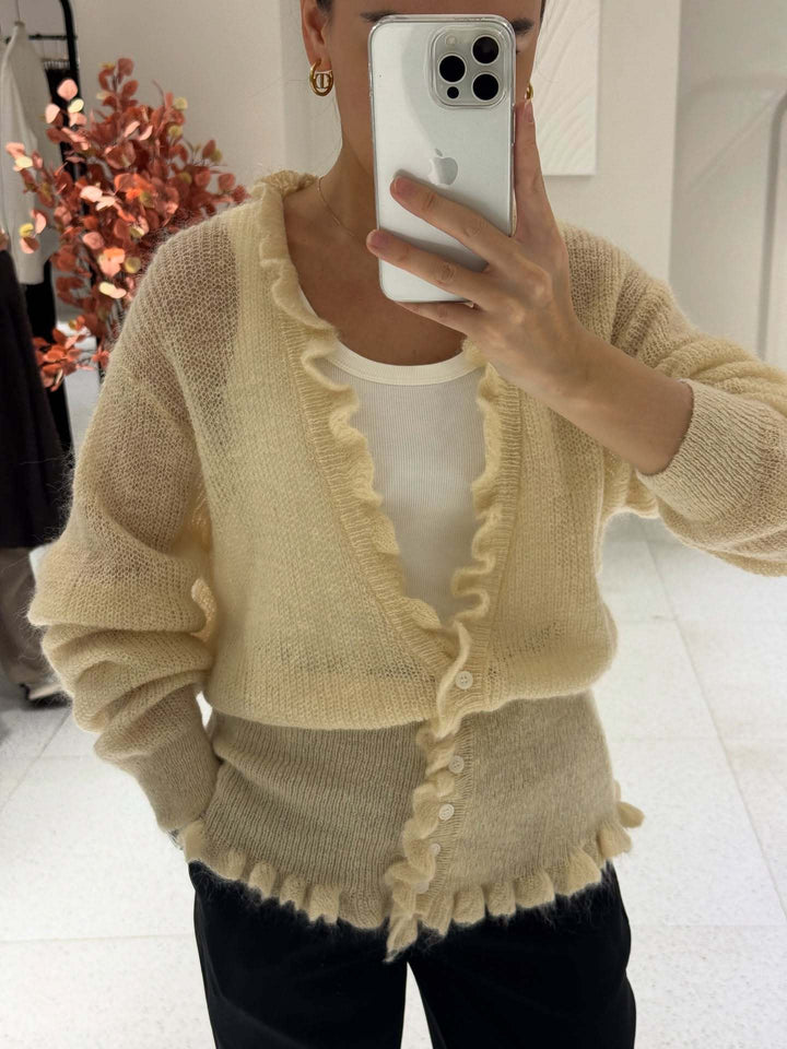 Kvinnors kofta med lekfull ruffle-design Mirla-Eva Jonsson