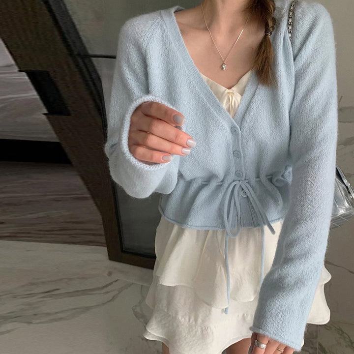 Kvinnors kofta med skräddarsydd design och knytbart bälte Mirla-Eva Jonsson