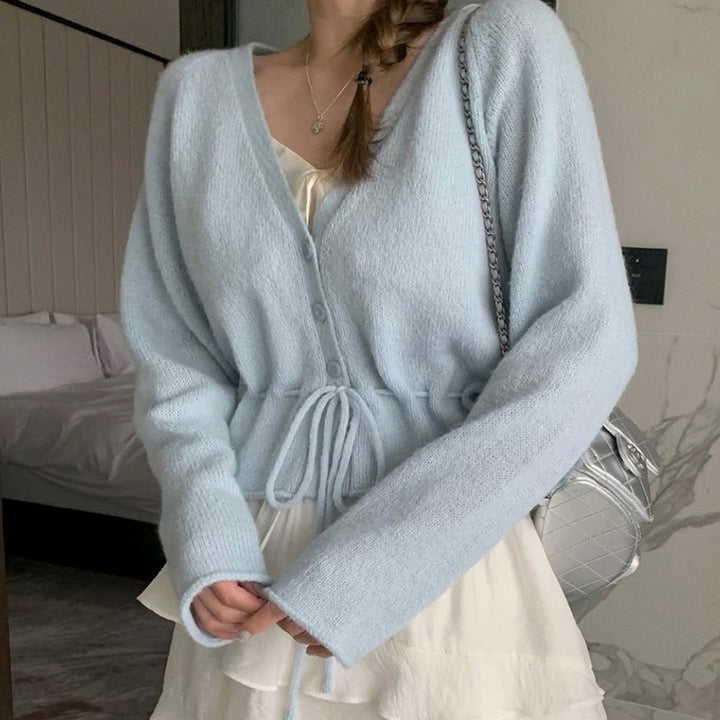 Kvinnors kofta med skräddarsydd design och knytbart bälte Mirla-Eva Jonsson
