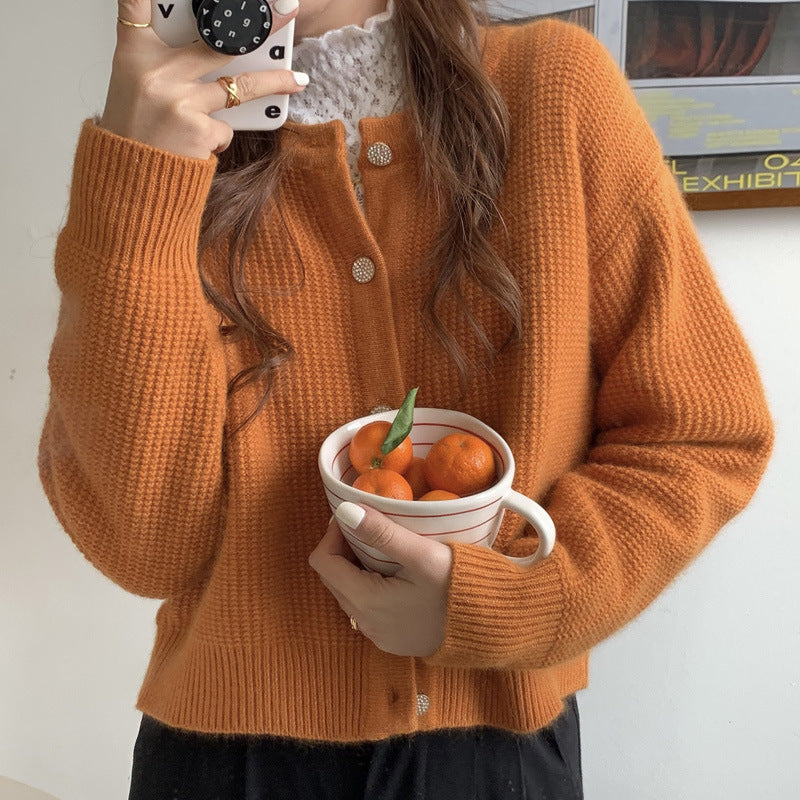 Kvinnors kofta med sofistikerad knappdetalj och bred skärning Mirla-Eva Jonsson