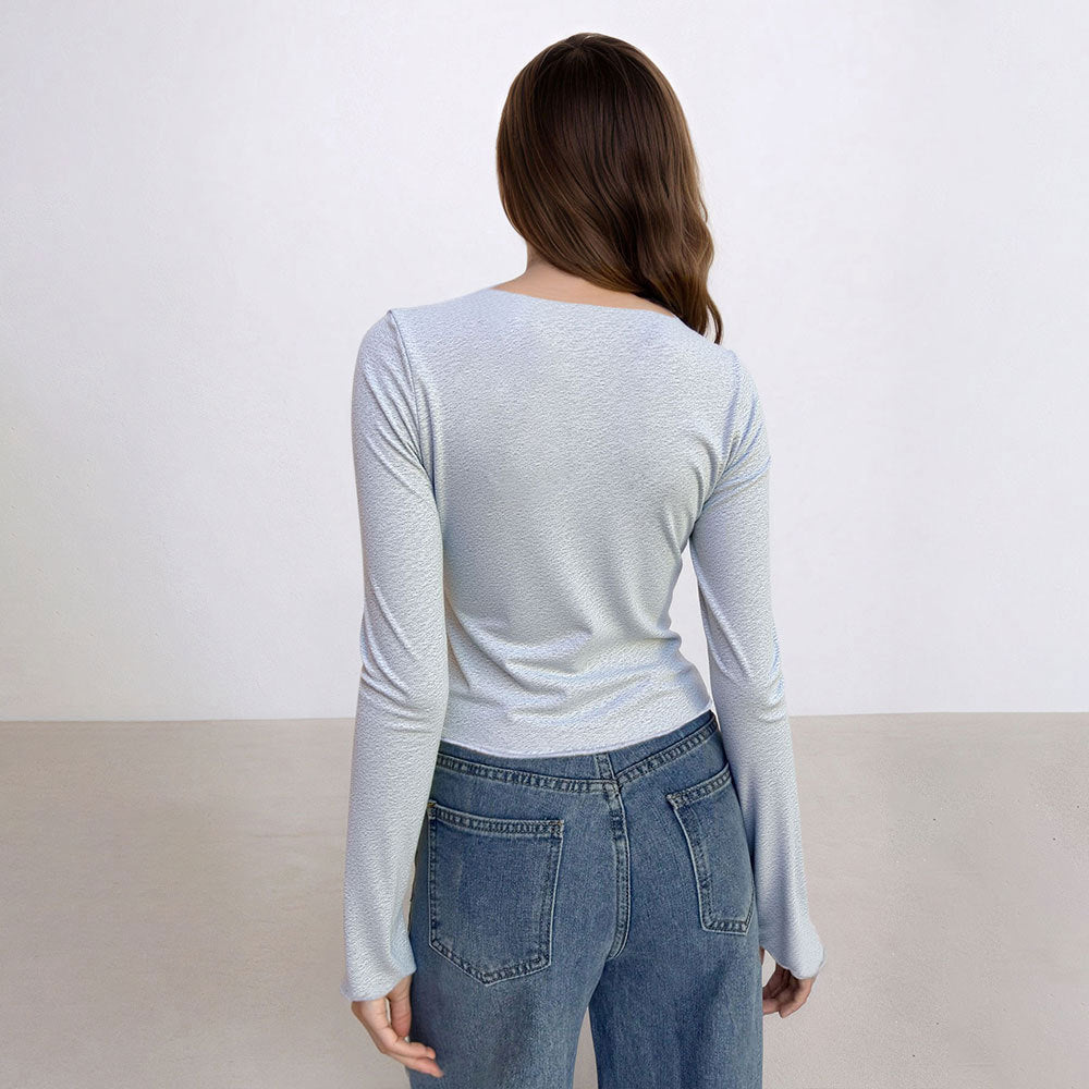 Kvinnors korta långärmad skjorta med sidoklyfta och elegant design Mirla-Eva Jonsson