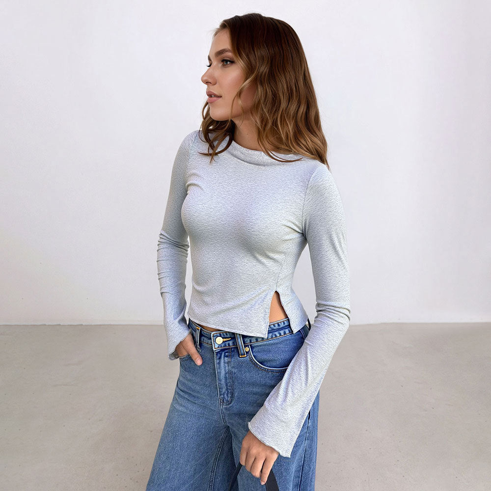Kvinnors korta långärmad skjorta med sidoklyfta och elegant design Mirla-Eva Jonsson