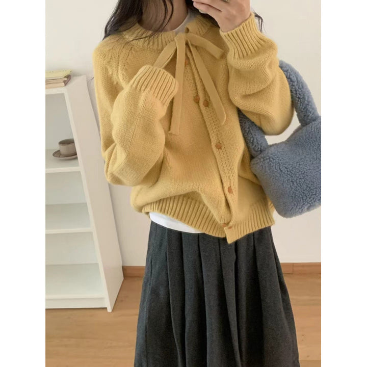 Kvinnors korta stickad cardigan med band och lätt material Mirla-Eva Jonsson
