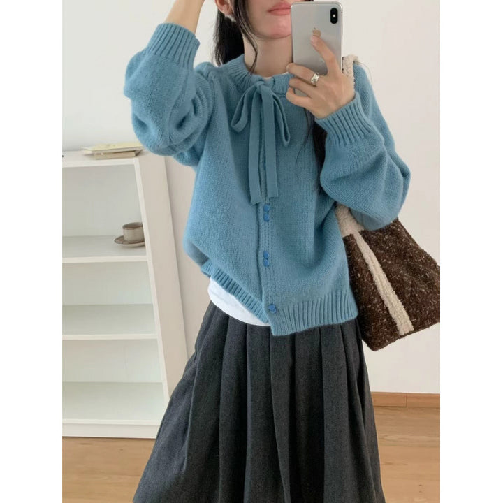 Kvinnors korta stickad cardigan med band och lätt material Mirla-Eva Jonsson