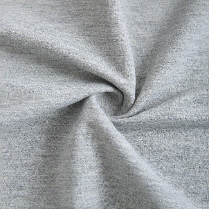 Kvinnors kortad sweatshirt med asymmetrisk design och voluminösa ärmar Mirla-Eva Jonsson