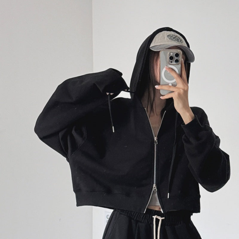 Kvinnors kortärmad hoodie med dragkedja och elastiska ärmslut Mirla-Eva Jonsson