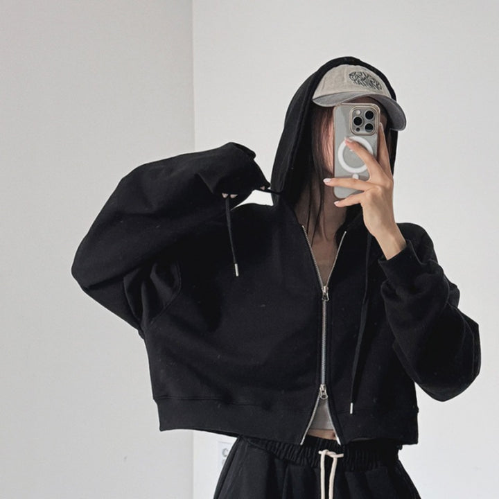 Kvinnors kortärmad hoodie med dragkedja och elastiska ärmslut Mirla-Eva Jonsson