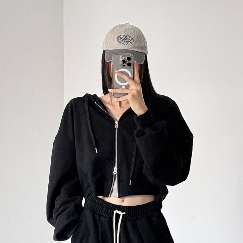 Kvinnors kortärmad hoodie med dragkedja och elastiska ärmslut Mirla-Eva Jonsson
