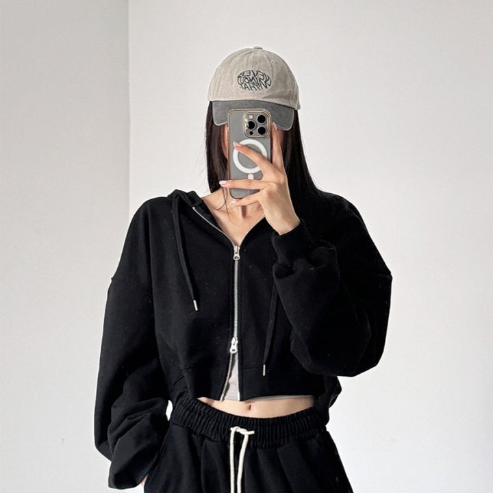 Kvinnors kortärmad hoodie med dragkedja och elastiska ärmslut Mirla-Eva Jonsson
