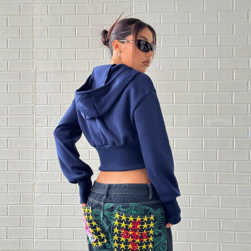 Kvinnors kortärmad hoodie med dragkedja och vida ärmar Mirla-Eva Jonsson