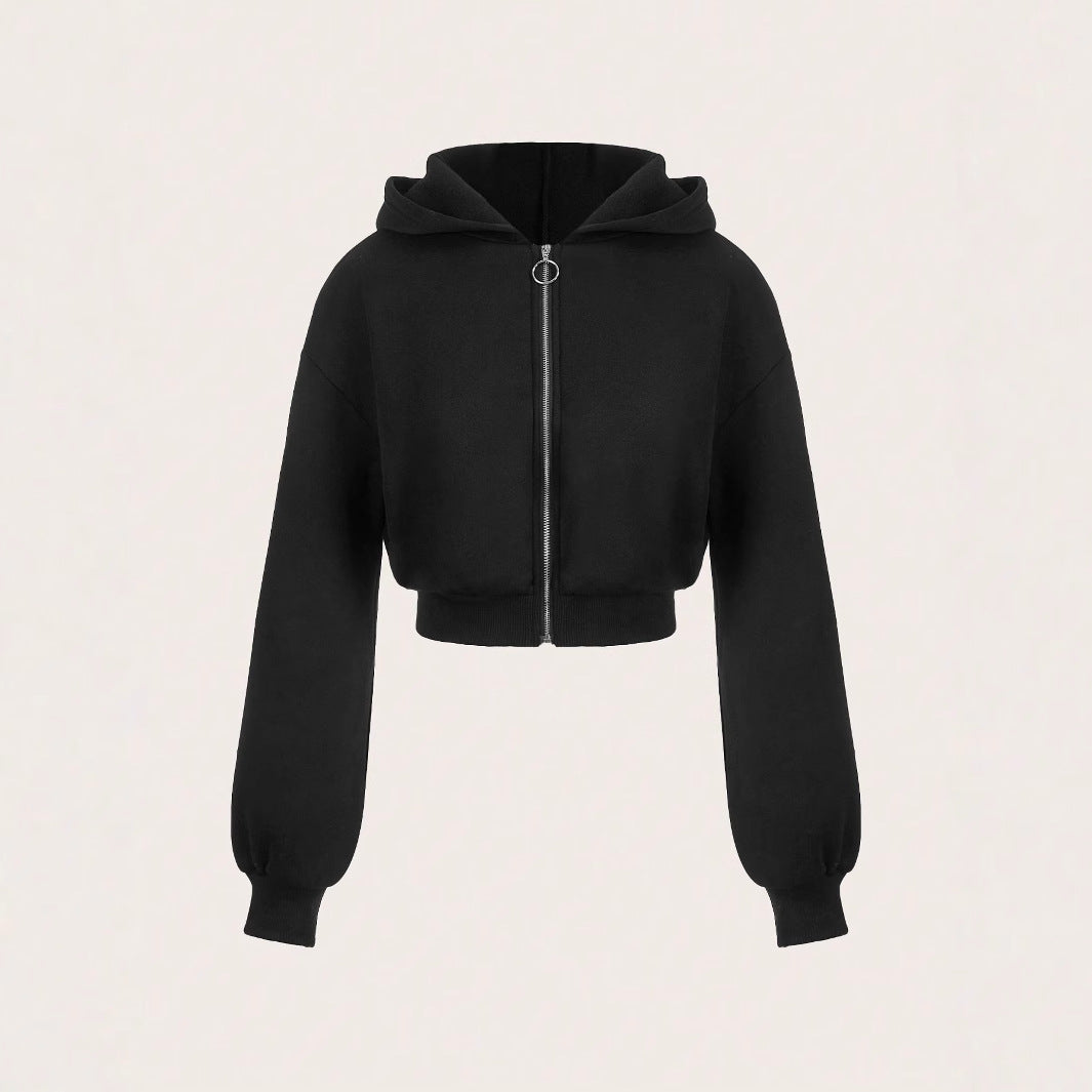 Kvinnors kortärmad hoodie med innovativ dragkedja och voluminösa ärmar Mirla-Eva Jonsson