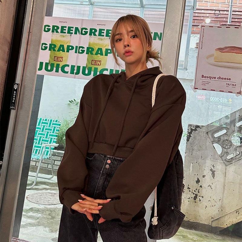 Kvinnors kortärmad hoodie med oversized passform Mirla-Eva Jonsson