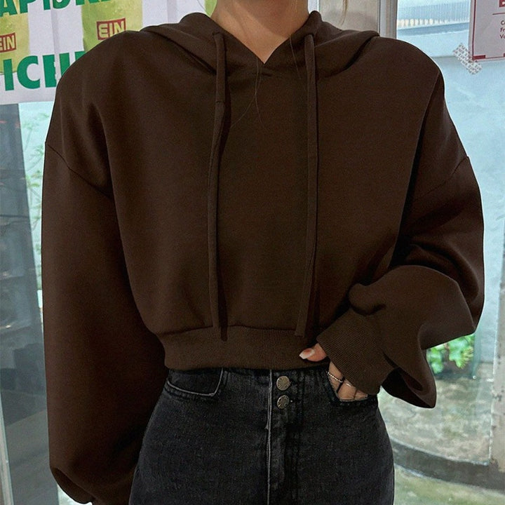 Kvinnors kortärmad hoodie med oversized passform Mirla-Eva Jonsson