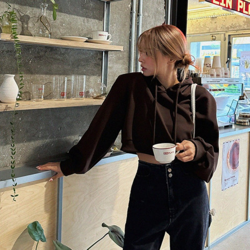 Kvinnors kortärmad hoodie med oversized passform Mirla-Eva Jonsson