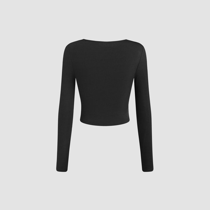 Kvinnors kortärmad långärmad skjorta med sofistikerad drapering design och moderiktig rund hals Mirla-Eva Jonsson