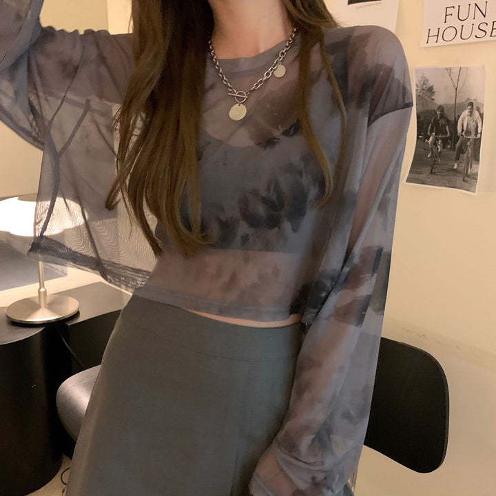 Kvinnors kortärmad sweatshirt i modern batikdesign med vida ärmar och rund halsringning Mirla-Eva Jonsson