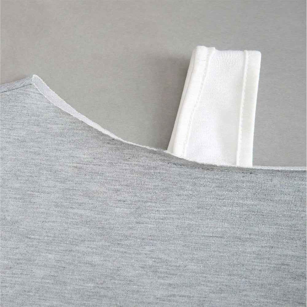 Kvinnors kortärmad sweatshirt med asymmetrisk design och voluminösa ärmar Mirla-Eva Jonsson