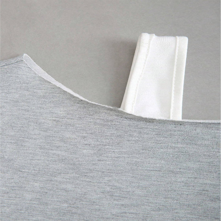 Kvinnors kortärmad sweatshirt med asymmetrisk design och voluminösa ärmar Mirla-Eva Jonsson