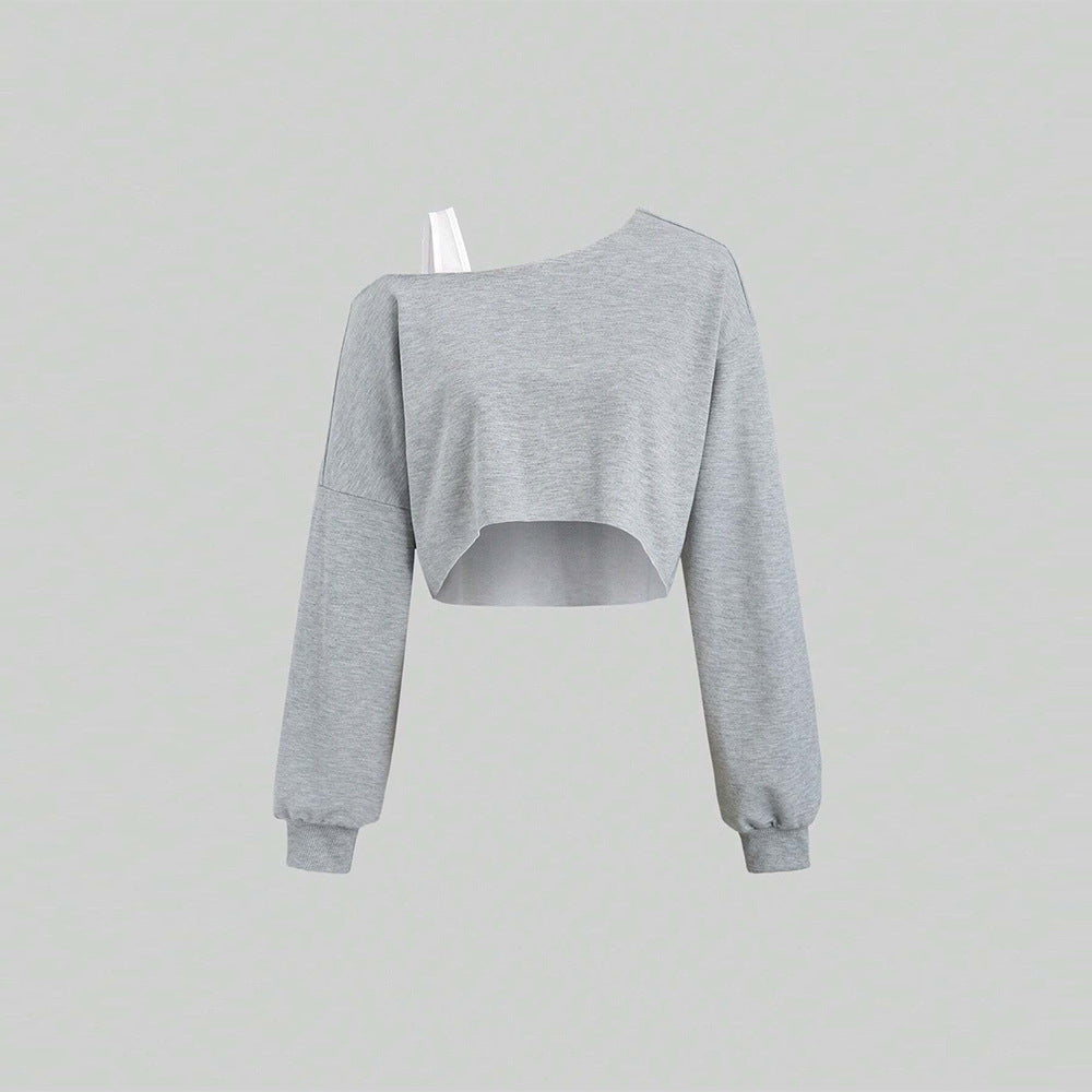 Kvinnors kortärmad sweatshirt med asymmetrisk design och voluminösa ärmar Mirla-Eva Jonsson