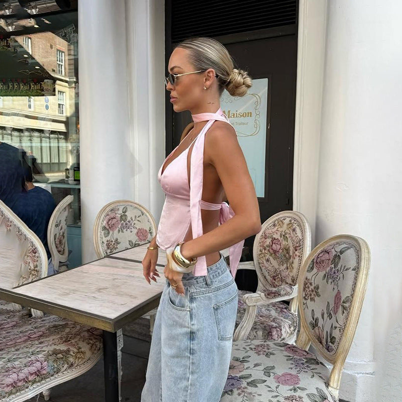 Kvinnors kortärmad topp med asymmetrisk halterneckdesign och delikat samling Mirla-Eva Jonsson
