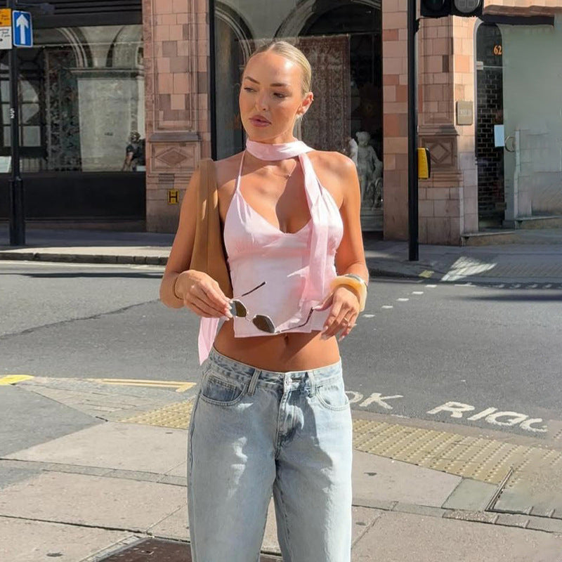 Kvinnors kortärmad topp med asymmetrisk halterneckdesign och delikat samling Mirla-Eva Jonsson